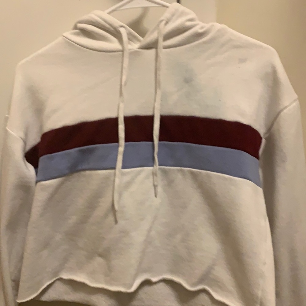 Cropped colored white hoodie top.